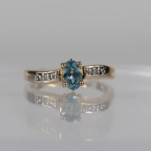 9ct Yellow Gold Blue Topaz & Diamond Accent Ring
